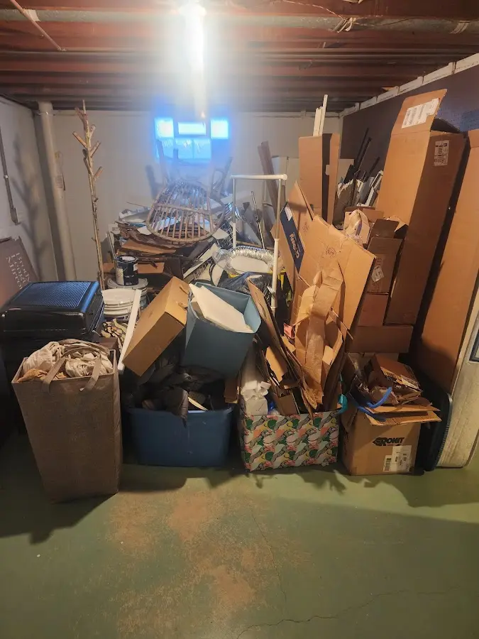 Roll-off dumpster container at job site for Construction Dumpster Rental in Groton